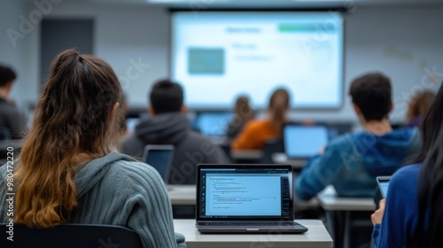 Wallpaper Mural A modern classroom with students using laptops and tablets for learning, digital whiteboards displaying interactive content, Torontodigital.ca