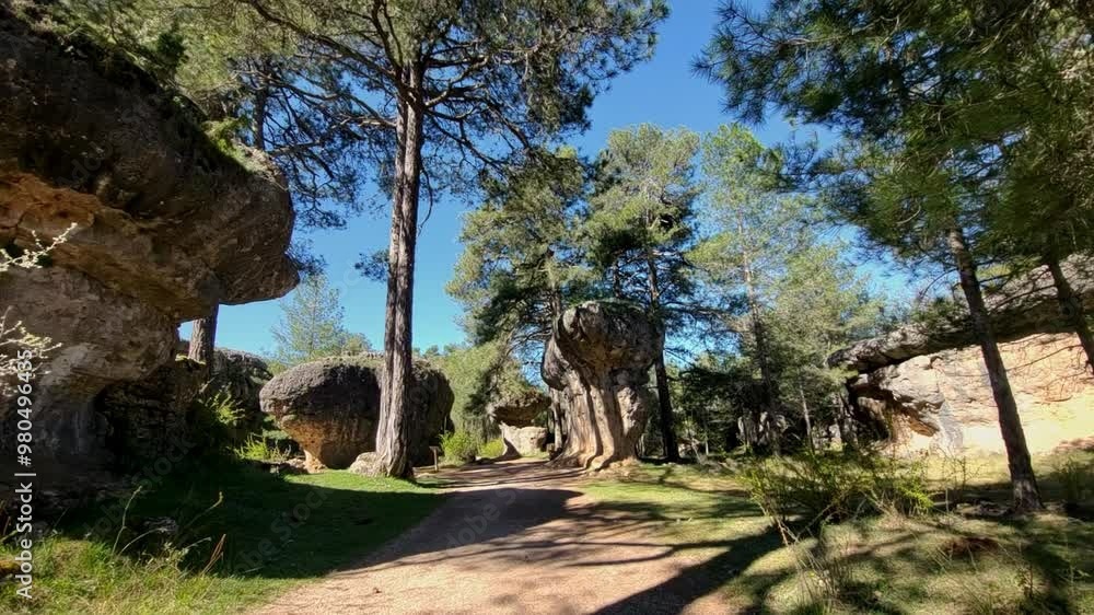 Walk through forest with strangely shaped rocks. Stone forest. . Enchanted city. Cuenca. Spain Walk through forest with strangely shaped rocks. Stone forest. . Enchanted city. Cuenca. Spain