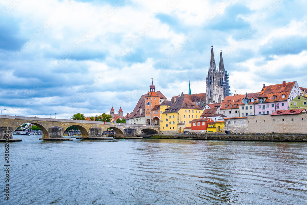 Regensburg, Germany - The picturesque skyline including the stone bridge over the Danube River, Saint Peter's Church