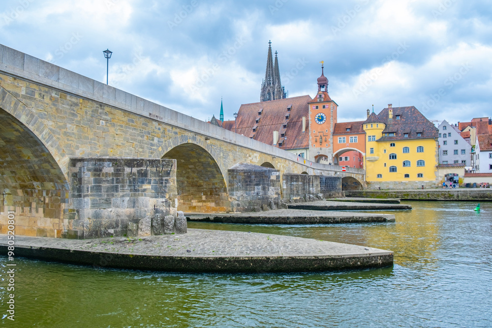 Regensburg, Germany - The picturesque skyline including the stone bridge over the Danube River, Saint Peter's Church