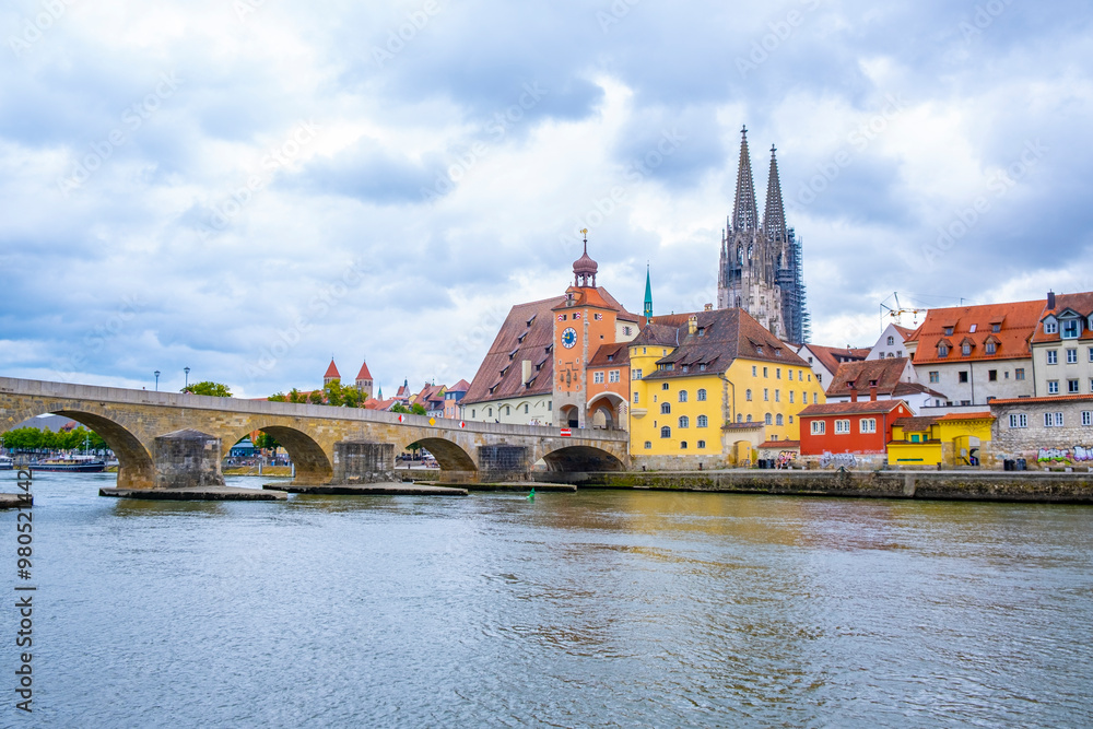 Regensburg, Germany - The picturesque skyline including the stone bridge over the Danube River, Saint Peter's Church