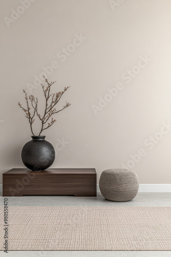 Minimalist interior design featuring a decorative vase and wooden table in a serene living space