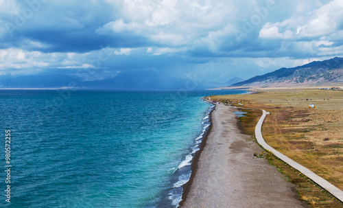 Aerial photography of the famous Sayram Lake and grassland pastures in Xinjiang, China