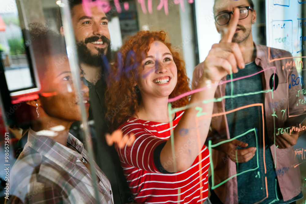 © NDABCREATIVITY - Team of programmers writing digital code in the metaverse and working together on the internet © NDABCREATIVITY - Team of programmers writing digital code in the metaverse and working together on the internet