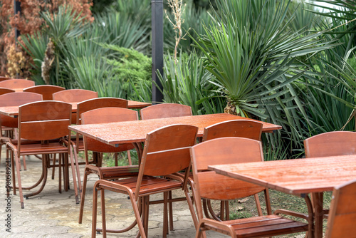 Obraz na płótnie A cafe or restaurant on the street. Table and chairs in the resort town w salonie