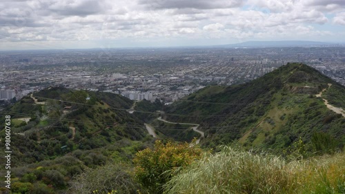 View from Runyon Canyon Park showcasing the hills, trails, and the city below. photo