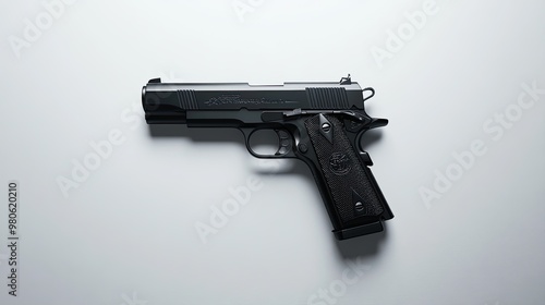 Black Semi-Automatic Handgun on White Background photo