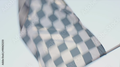 Racing marshal waving Checkered race at finish line on a raceway. Victory, achievement, success and sport concept. Grand Prix. Slow motion