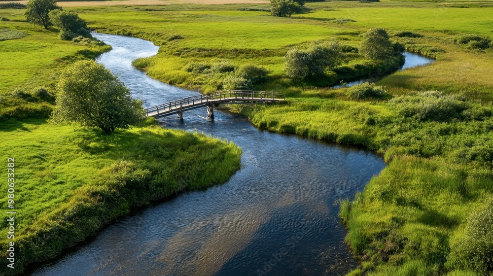 A river meandering through a picturesque countryside, with small wooden bridges crossing over the flowing water. A river meandering through a picturesque countryside, with small wooden bridges crossing over the flowing water.