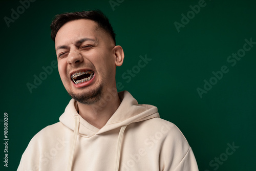 Man in a White Hoodie With Mouth Open