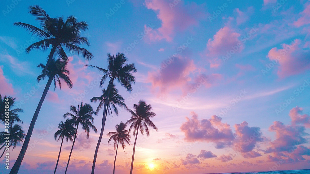 Silhouettes of palm trees against golden and purple sunset create serene and tranquil atmosphere. vibrant colors of sky enhance beauty of this tropical scene Silhouettes of palm trees against golden and purple sunset create serene and tranquil atmosphere. vibrant colors of sky enhance beauty of this tropical scene