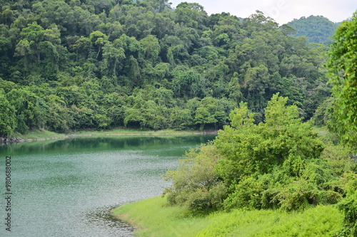 Taiyang Pi, located in Taiwan’s Yilan County, is a beautiful lake embraced by majestic mountains, with a mirror-like surface surrounded by lush greenery, making it an ideal tranquil retreat. photo