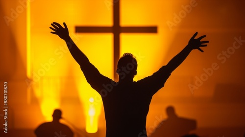 Silhouette of a person with a cross