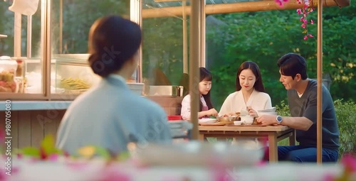 Wallpaper Mural A Korean family shares a warm and joyful meal at a food stall. The father, mother, and child smile happily surrounded by peaceful nature Torontodigital.ca