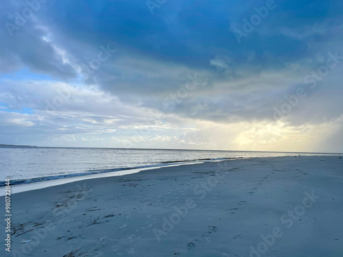 Blue beach and forever blue cloudy sky