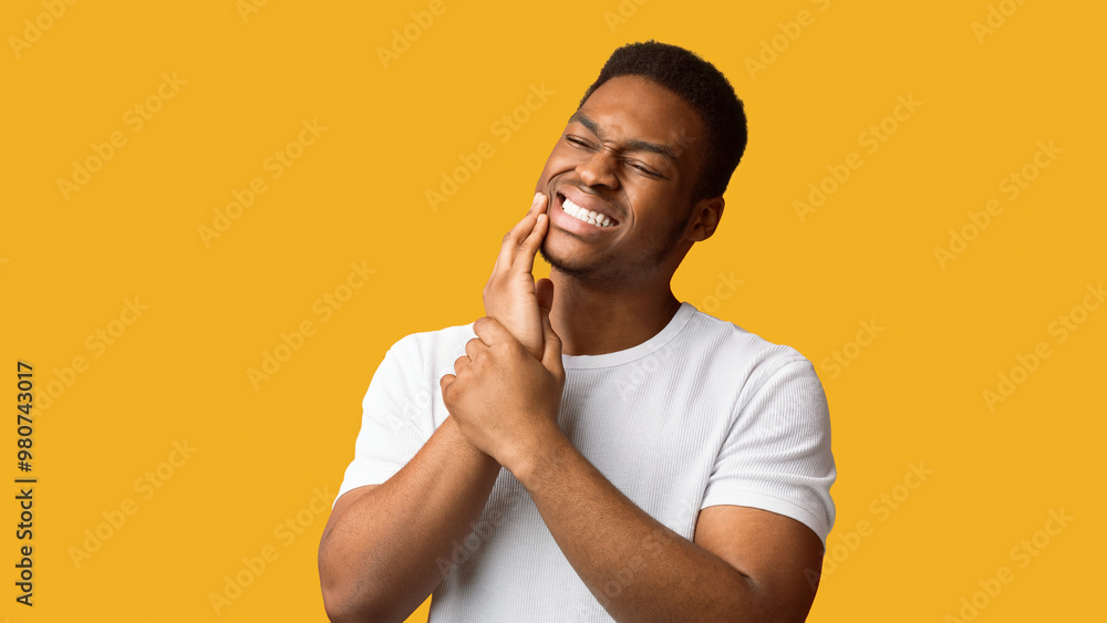 Toothache Concept. Portrait of black man touching cheek with abscessed tooth, panorama with copy space Toothache Concept. Portrait of black man touching cheek with abscessed tooth, panorama with copy space