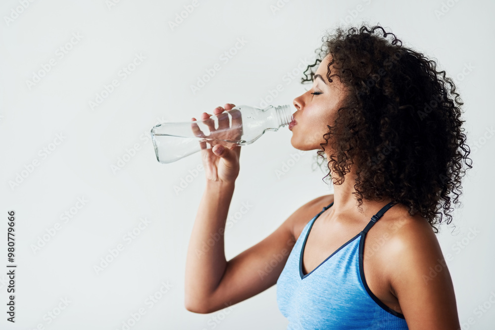 Woman, thirsty and drinking water in studio with fitness for hydration, break and tired of exercise with mockup. Athlete, person and liquid bottle for relax, wellness and beverage on white background Woman, thirsty and drinking water in studio with fitness for hydration, break and tired of exercise with mockup. Athlete, person and liquid bottle for relax, wellness and beverage on white background