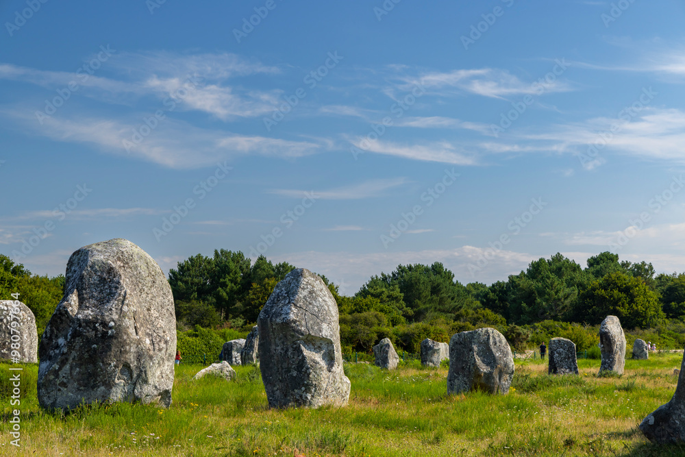 Standing stones (or menhirs) in Carnac, Morbihan, Brittany, France Standing stones (or menhirs) in Carnac, Morbihan, Brittany, France