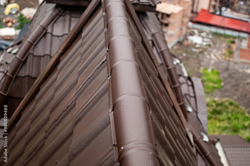 Close-Up of Modern Brown Metal Roof with Urban Background Close-Up of Modern Brown Metal Roof with Urban Background