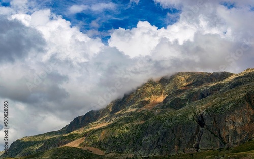 clouds over the mountains in the Alps