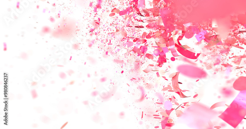 Pink confetti falls on black background