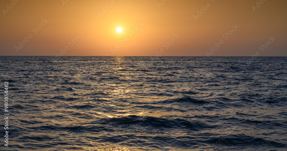 Dramatic sunset sky. Dramatic sunset over the sea Dramatic sunset sky. Dramatic sunset over the sea