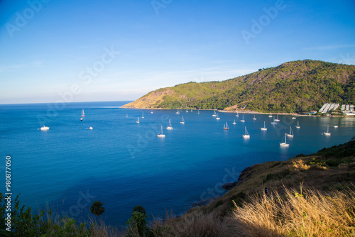 Three tropical white sandy beaches with turquoise clear water and palm trees.