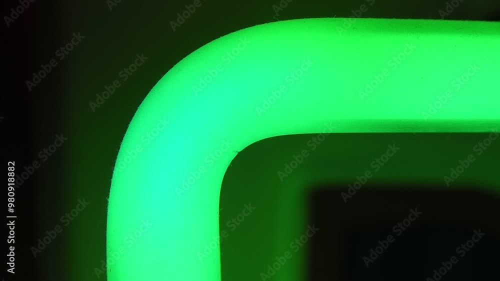 Neon bulb illuminating close up Neon bulb illuminating close up