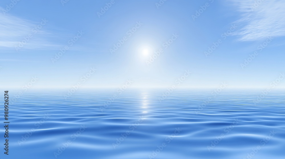 Fototapeta premium Serene ocean view under a bright blue sky, with gentle waves reflecting the sunlight.