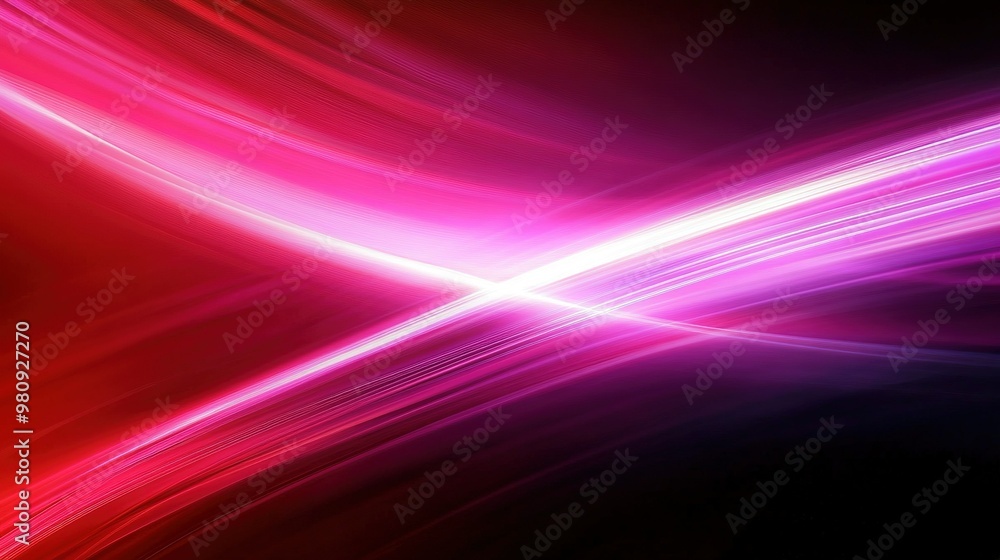 Vibrant abstract light trails intersecting in a dynamic display of color against a dark background Vibrant abstract light trails intersecting in a dynamic display of color against a dark background