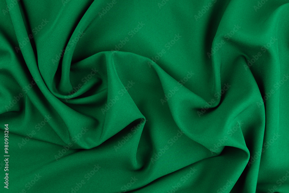 Fototapeta premium Texture, background, pattern. Texture of green silk fabric. Beautiful emerald green soft silk.