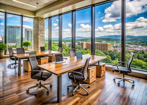 Modern office workspace in Knoxville, TN, featuring sleek wooden desks, ergonomic chairs, and plenty of natural light