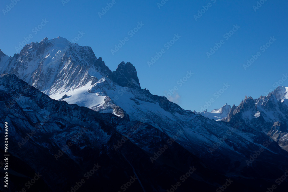 Fototapeta premium Snowy mountain heights in the morning, mountain landscape of the Alps