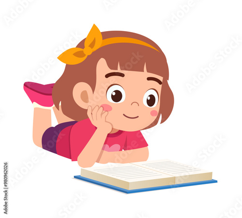 little kid reading a book while lying on stomach on the floor