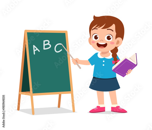 little kid writing on blackboard with chalk to study