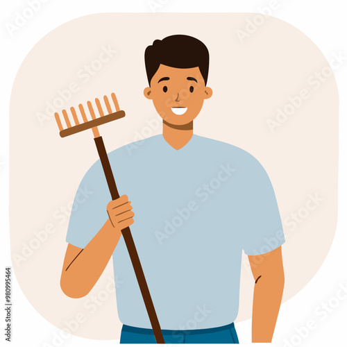 A man is holding a rake and smiling. Concept of happiness and leisure, as the man is enjoying his time outdoors while tending to his yard