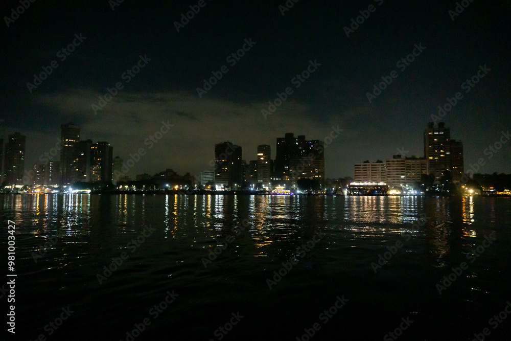Cairo city skyline at the Nile river at night Cairo city skyline at the Nile river at night