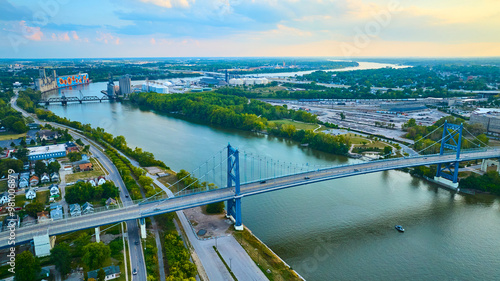 Bild auf Leinwand Aerial View of Toledo Anthony Wayne Bridge at Sunset Over Maumee River