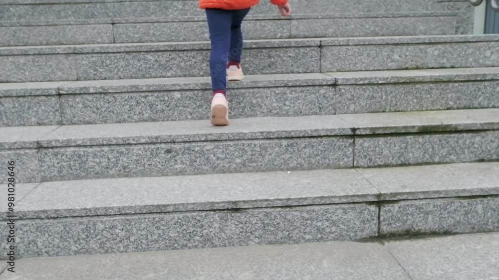 Children, happy Siblings in matching orange jackets race up stairs to school, filled with energy and excitement, Back to school concept Children, happy Siblings in matching orange jackets race up stairs to school, filled with energy and excitement, Back to school concept