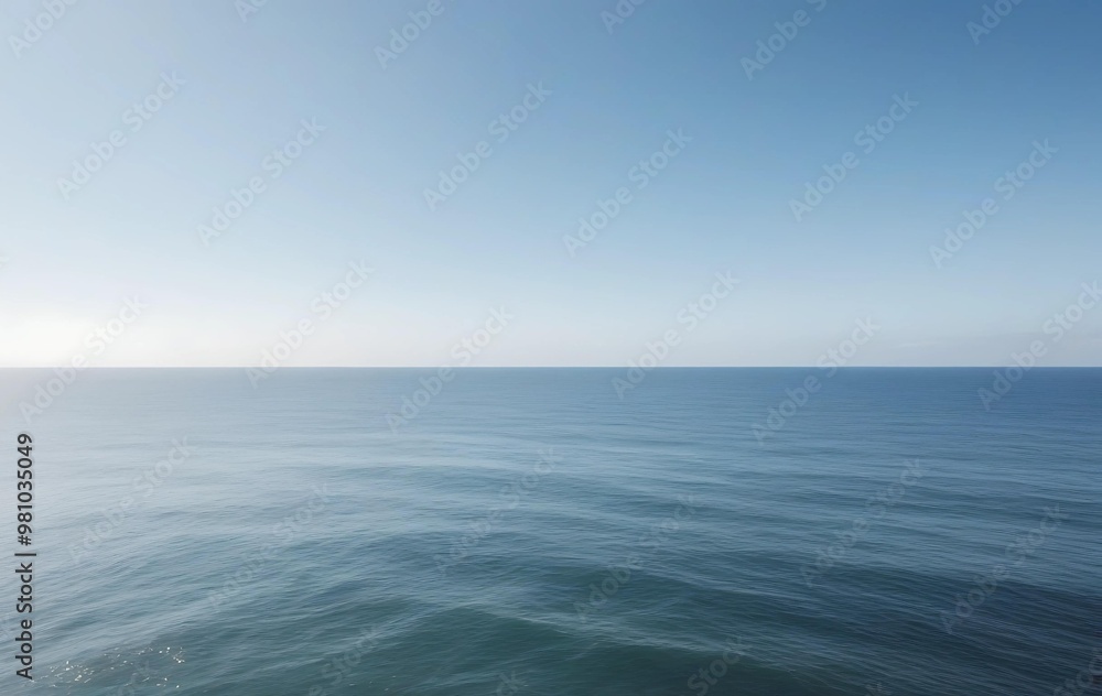 A tranquil ocean with gentle waves stretching into the horizon. The sky above is mostly blank, offering plenty of copy space.
A tranquil ocean with gentle waves stretching into the horizon. The sky above is mostly blank, offering plenty of copy space.