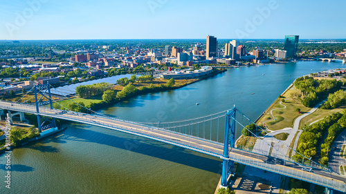 Aerial View of Blue Suspension Bridge and Toledo Skyline Over Maumee River