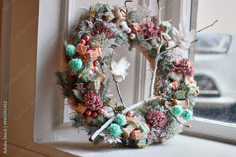 Φωτογραφία Christmas wreath in pink colors with roses and birds in romantic style