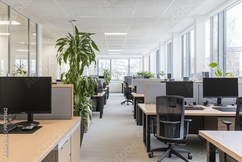 A minimalist office space using eco-friendly furniture made from recycled materials  and natural light  promoting sustainability and simplicity.