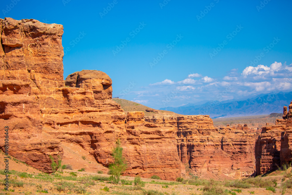 Charyn Canyon, Valley of Castles. The excellence of Kazakhstan. Panorama of natural unusual landscape. The red canyon of extraordinary beauty looks like a Martian landscape. Charyn Canyon, Valley of Castles. The excellence of Kazakhstan. Panorama of natural unusual landscape. The red canyon of extraordinary beauty looks like a Martian landscape.