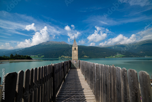 View of Lake Resia where you can admire the famous bell tower of