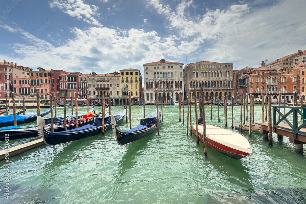Gondola photo in Venice. Beautiful video with touristic taxi and local gondola boats cruising on the channels of Venice. Landmark landscape view of Italy. Gondola photo in Venice. Beautiful video with touristic taxi and local gondola boats cruising on the channels of Venice. Landmark landscape view of Italy.