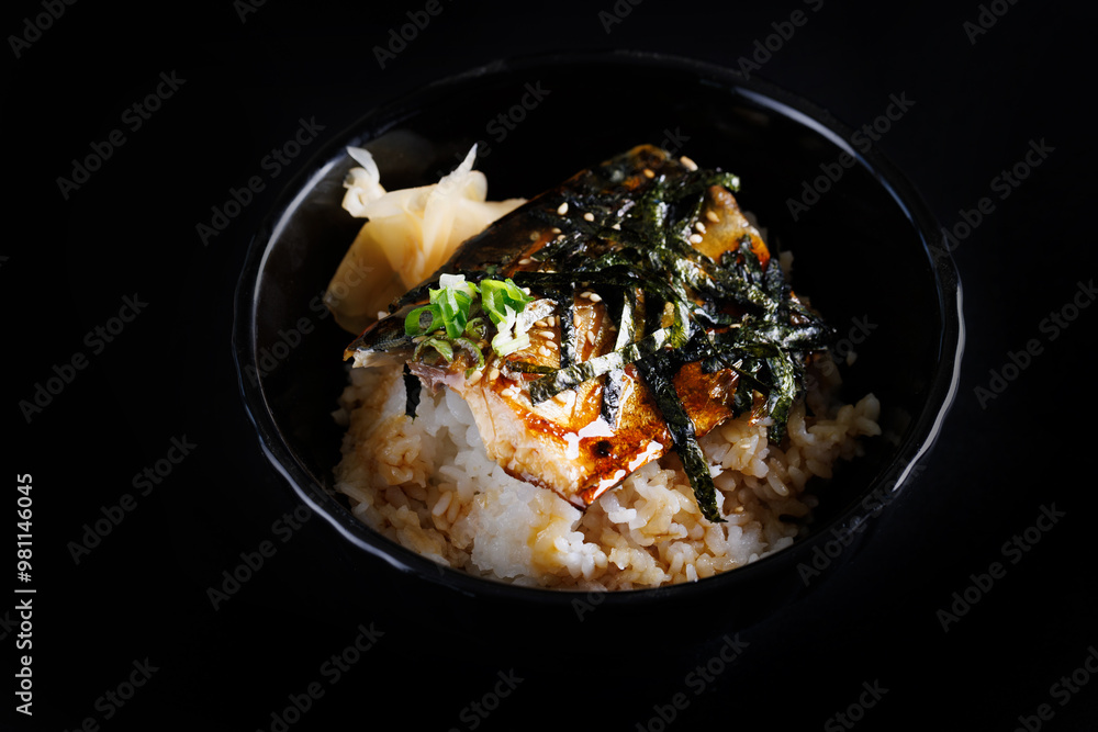 Saba Shioyaki Grill Saba fish japanese food isolate in black background Saba Shioyaki Grill Saba fish japanese food isolate in black background