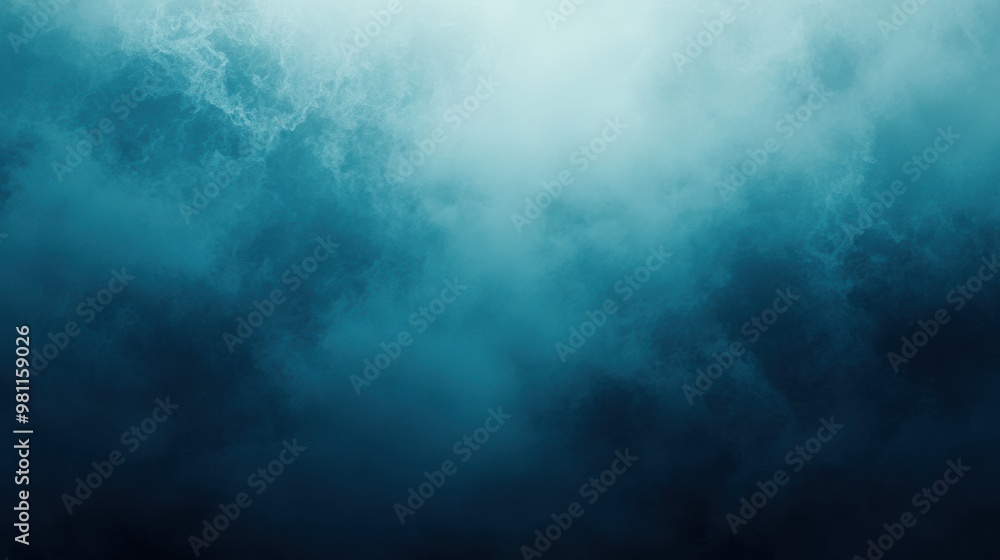 Obraz premium A subtle grainy gradient moving from dark teal to pale blue creating a calming abstract background