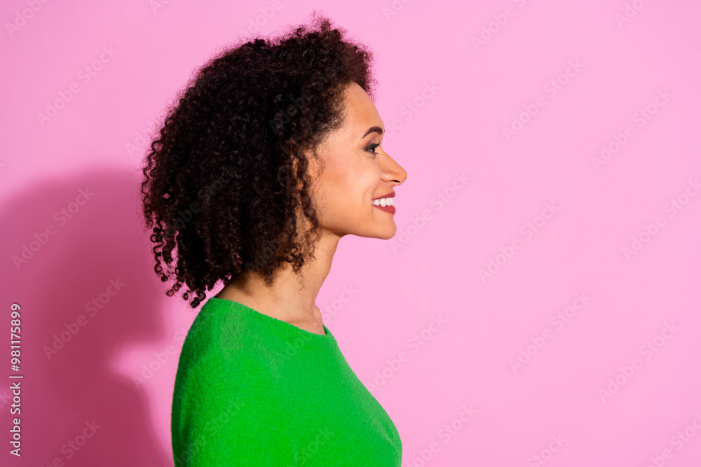 Photo of pretty lovely nice woman wear green stylish clothes look empty space isolated on pink color background Photo of pretty lovely nice woman wear green stylish clothes look empty space isolated on pink color background