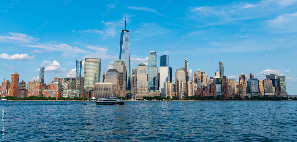 Fototapeta premium Cruise ship York. Skyline of New York Manhattan cruising on the Hudson River cruise liner. New york cruise lines ships vacation